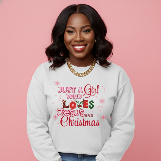 Woman wearing a white sweatshirt with Christmas-themed text on a pink background